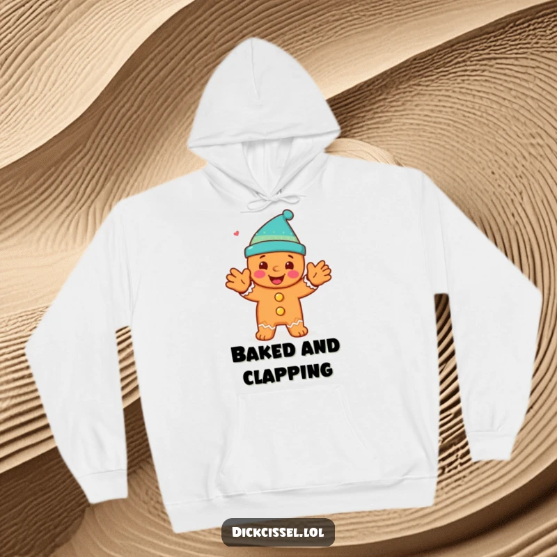 Funny hoodie featuring a happy gingerbread man character doing a spirited clap, perfect for holiday warmth and fun.