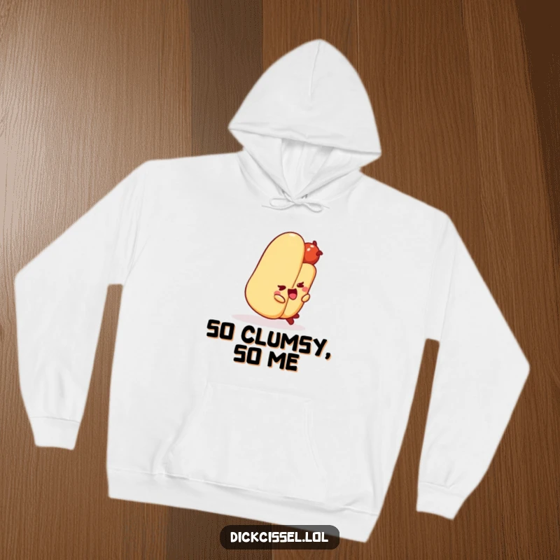 Funny hot dog character tripping over its bun, printed on a cozy hoodie for maximum humor.