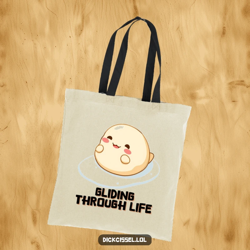 Funny tote bag showcasing a cheerful dumpling character enjoying a slippery slide, adding a touch of fun to errands.